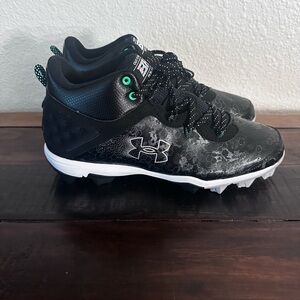 Under Armour Black and White Baseball Cleats with Green Accents